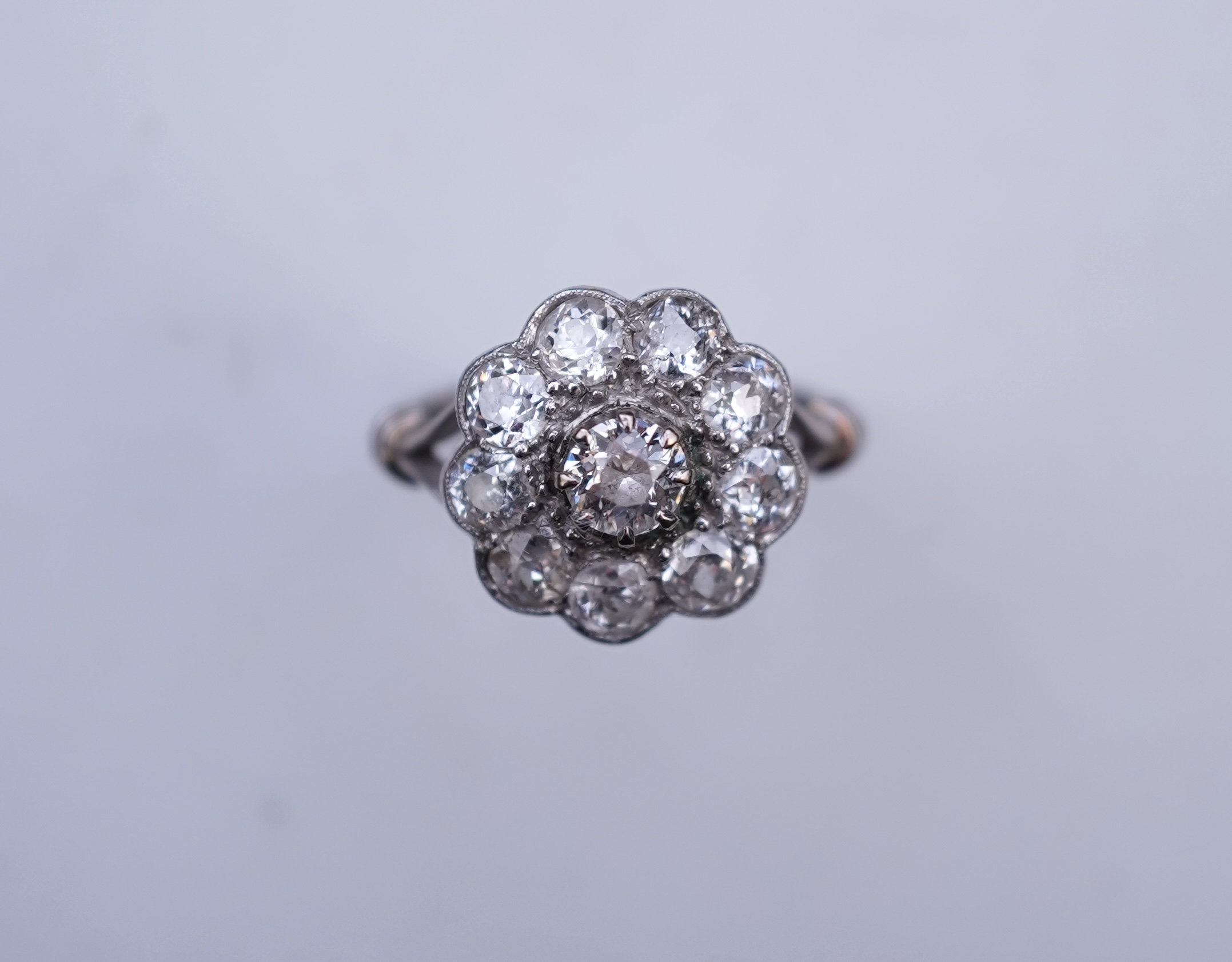 A diamond cluster ring, early 20th century